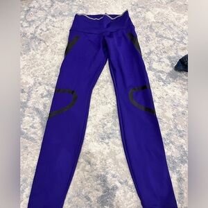 Stella McCartney purple workout leggings